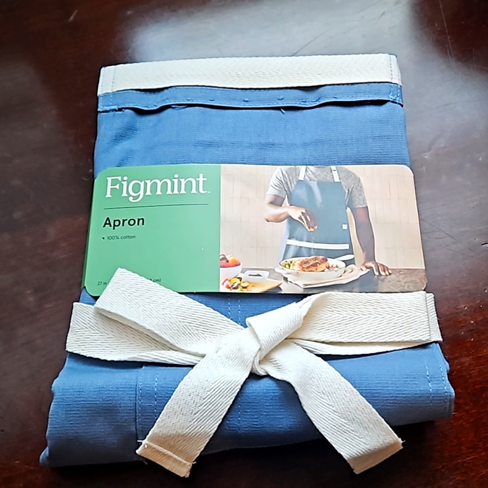Figment Blue Apron with Ivory Detailing NWT.  Unopened packaging.